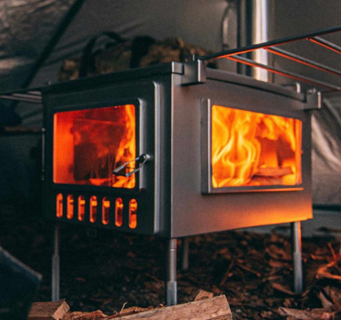 Tent Wood Stove Burning Firewood as Fuel