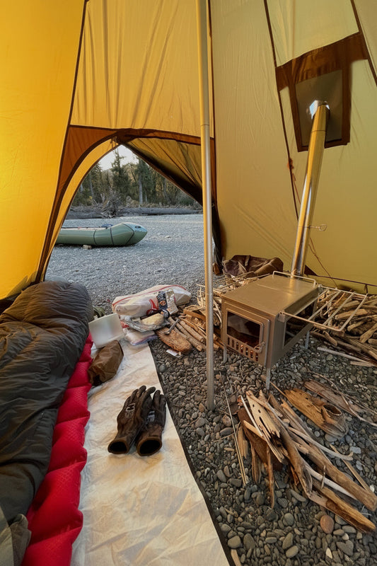 Hot tent with stove jack and raft