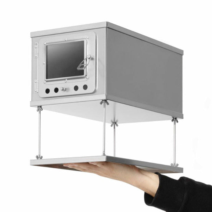 W-stove Titanium Folding Tent Wood Stove (3W) in hand to show ultralight materials by WIld Wild West